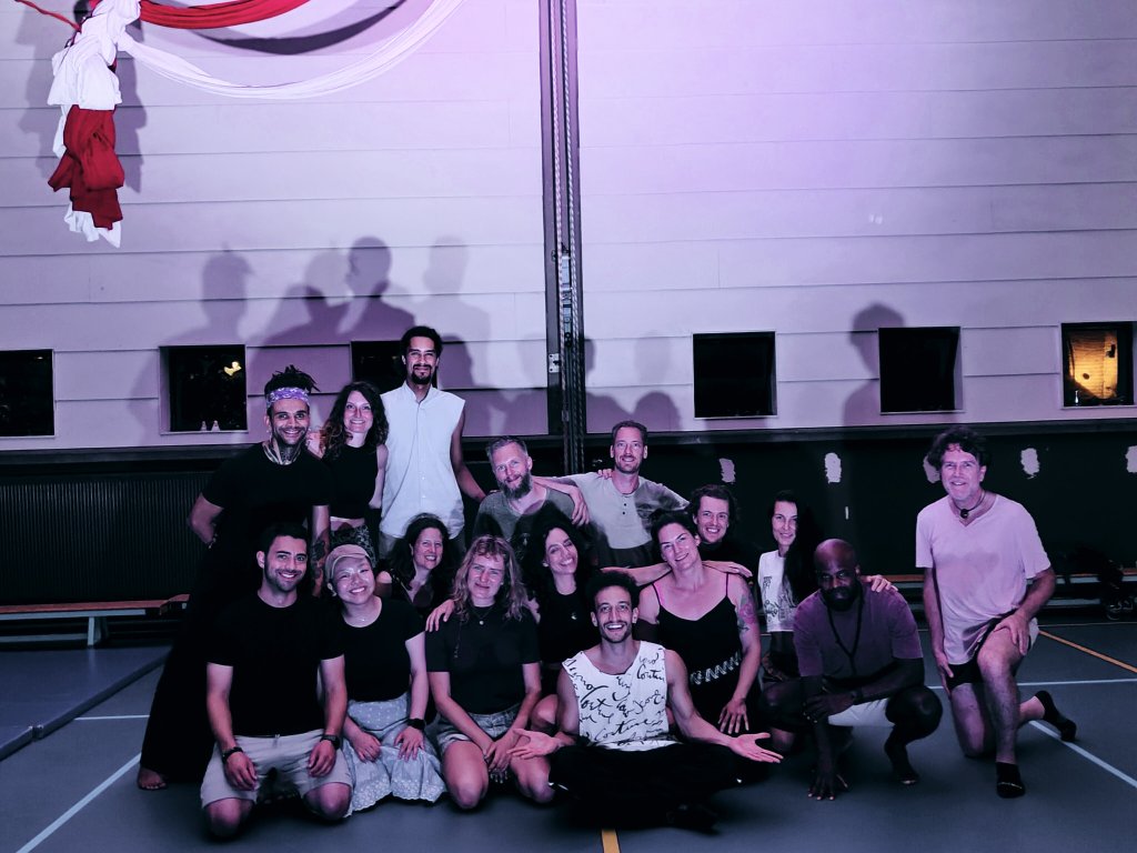 Group of workshop participants smiling together after a session
